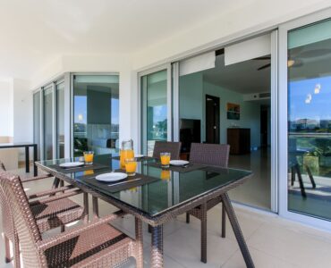 exclusive 2 bedroom condo for sale in mareazul playa del carmen terrace table and jacuzzi