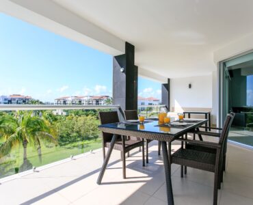 exclusive 2 bedroom condo for sale in mareazul playa del carmen terrace with table