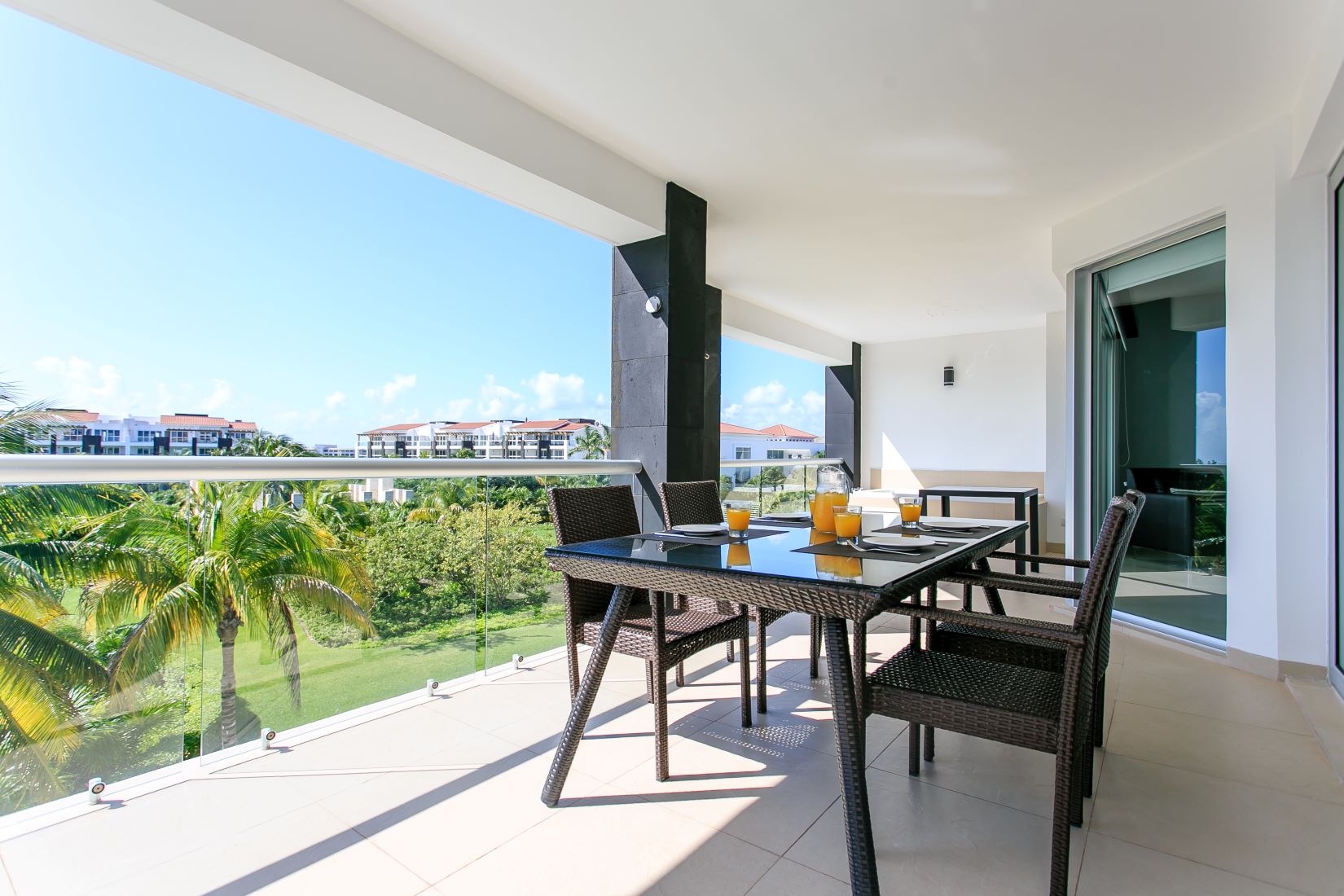 exclusive 2 bedroom condo for sale in mareazul playa del carmen terrace with table