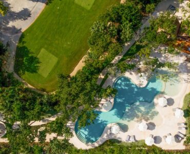 playa del carmen condos in corasol the village pool in the jungle