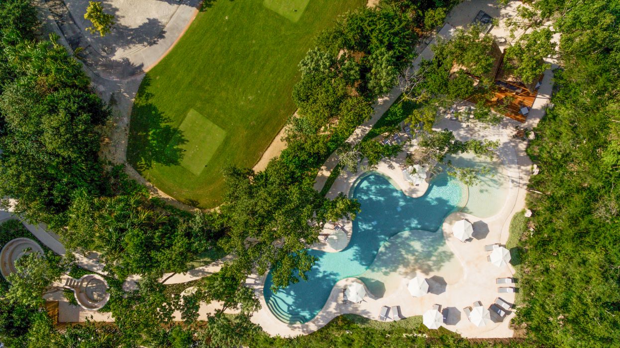 playa del carmen condos in corasol the village pool in the jungle