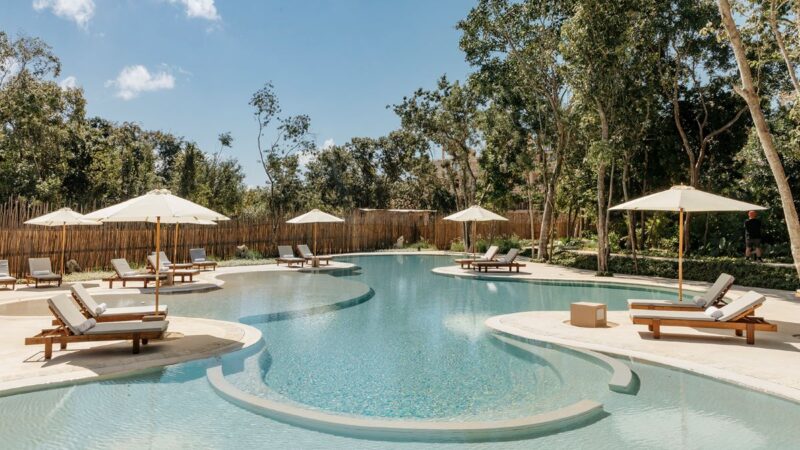 playa del carmen condos in corasol the village pool with sunbeds