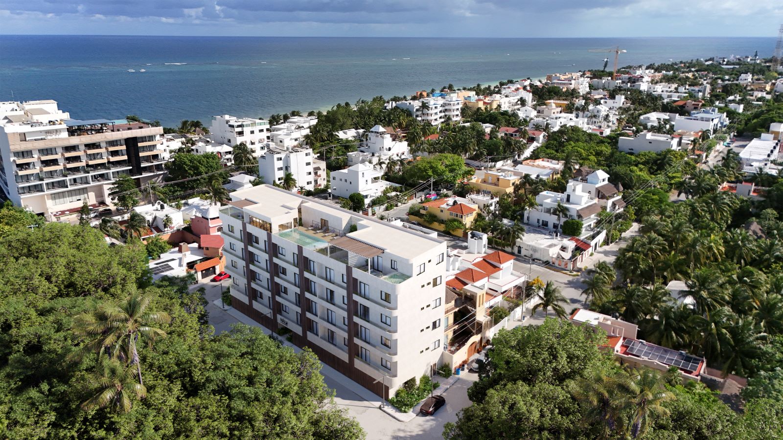 codos for sale near the beach at puerto morelos nalu residences building condos nears the sea