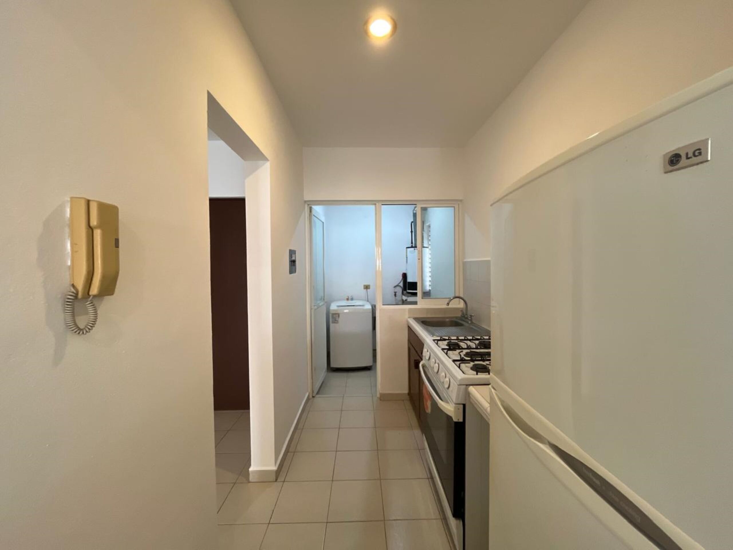 two bedroom condo at la concha playacar kitchen and laundry area