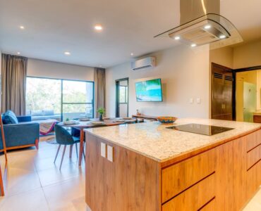 spacious 3 bedroom fully furnished condo in selvanova residencial coto 11 playa del carmen kitchen in open social area