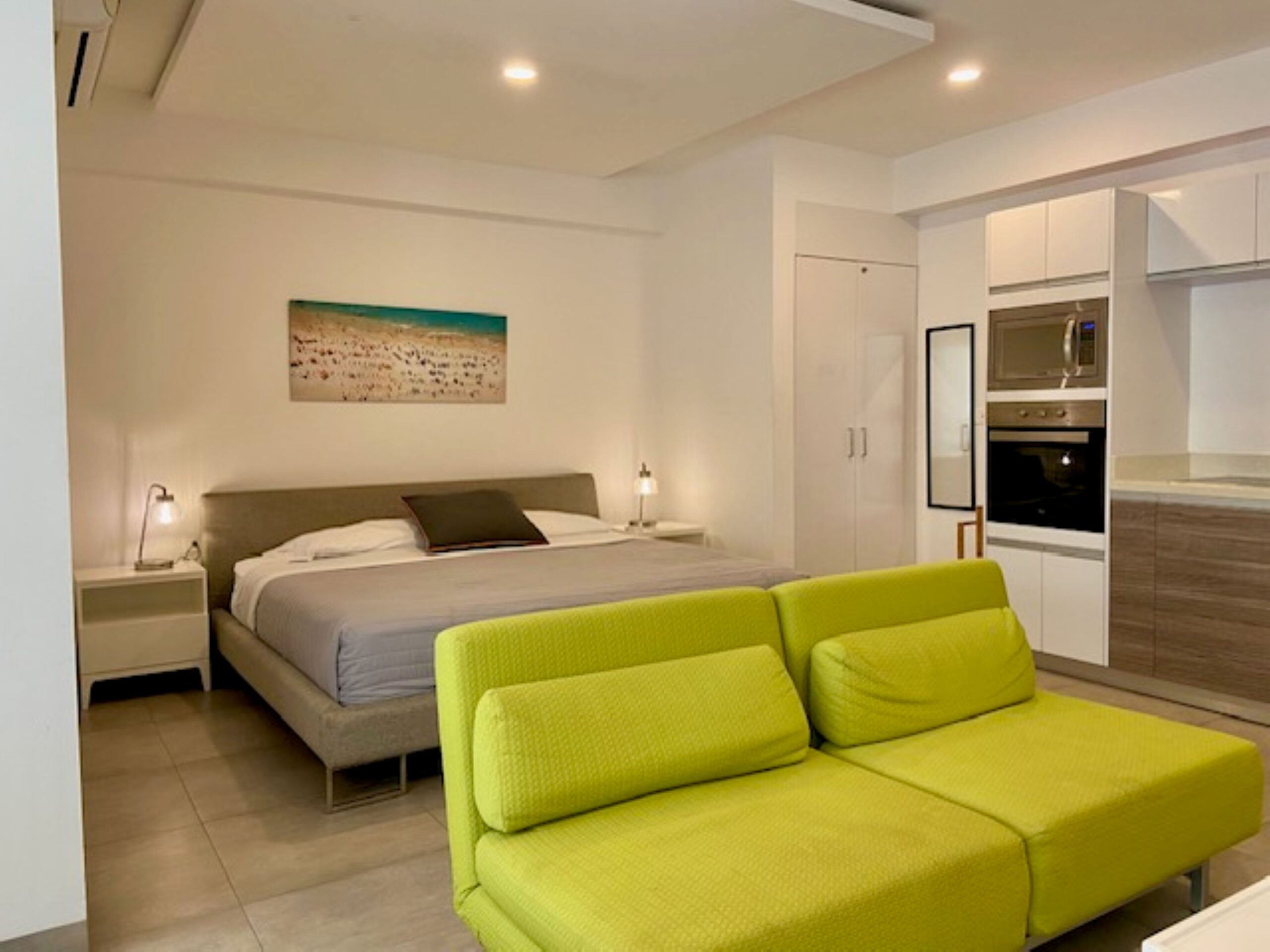 studio at playa del carmen icono 303 bed and sofa