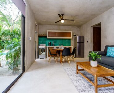 sukha 101 condo one bedroom la veleta tulum moskito real estate living and dining room with terrace