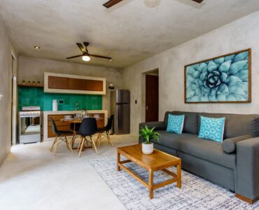 sukha 101 condo one bedroom la veleta tulum moskito real estate living room and table