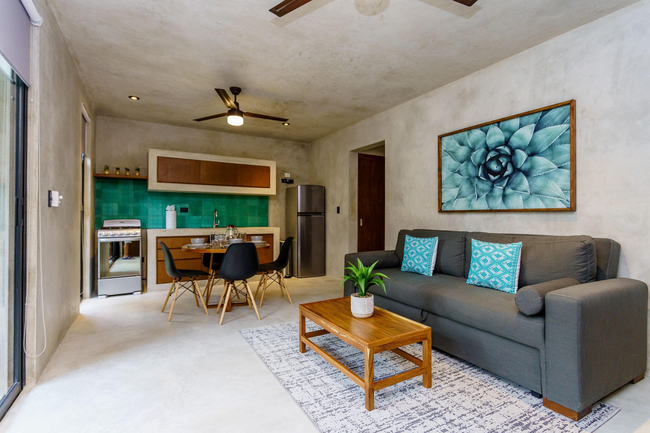 sukha 101 condo one bedroom la veleta tulum moskito real estate living room and table