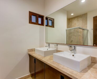 l playacar condos for sale akoya bathroom