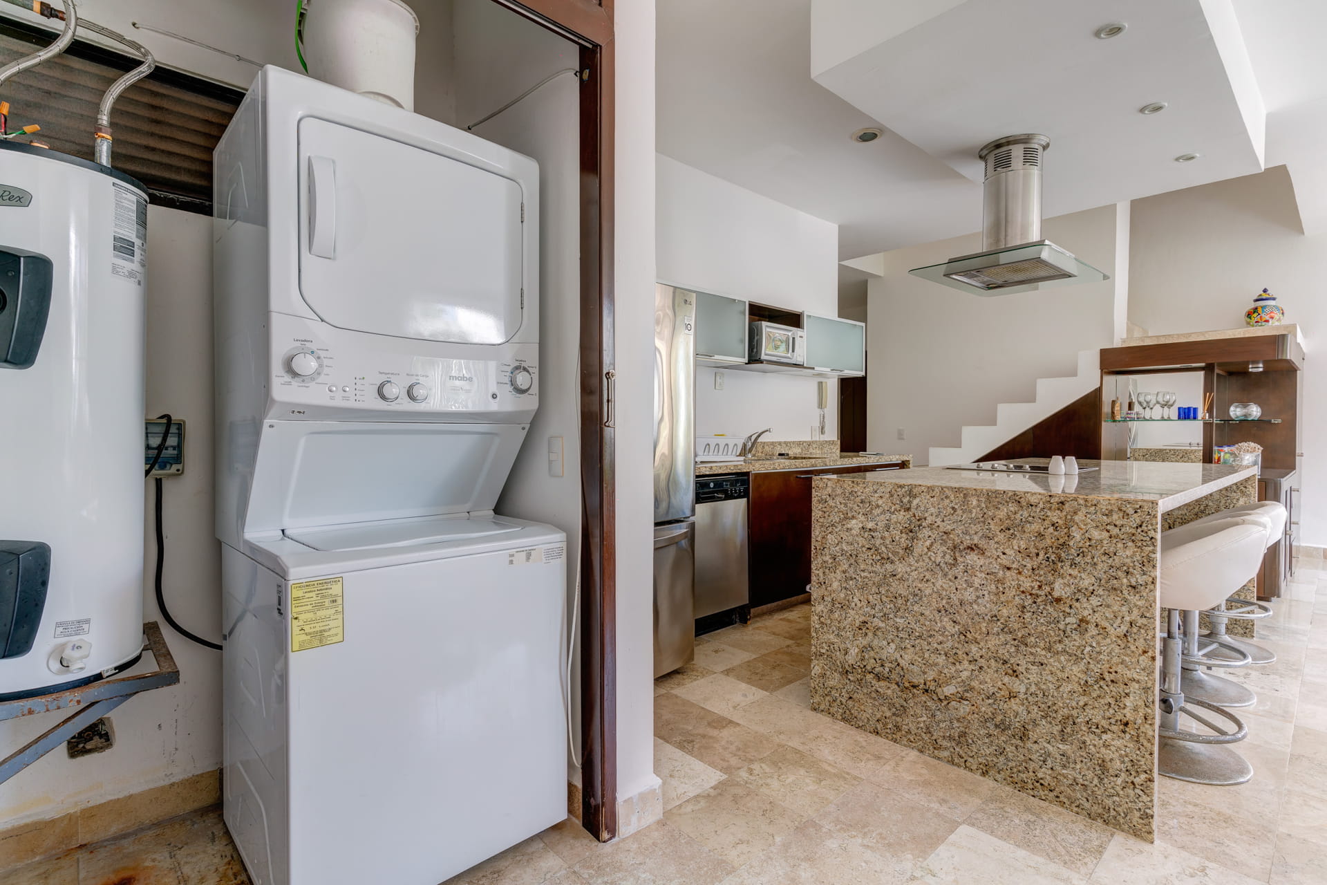 playacar condos for sale akoya laundry area