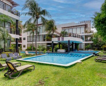 s playacar condos for sale akoya common area garden