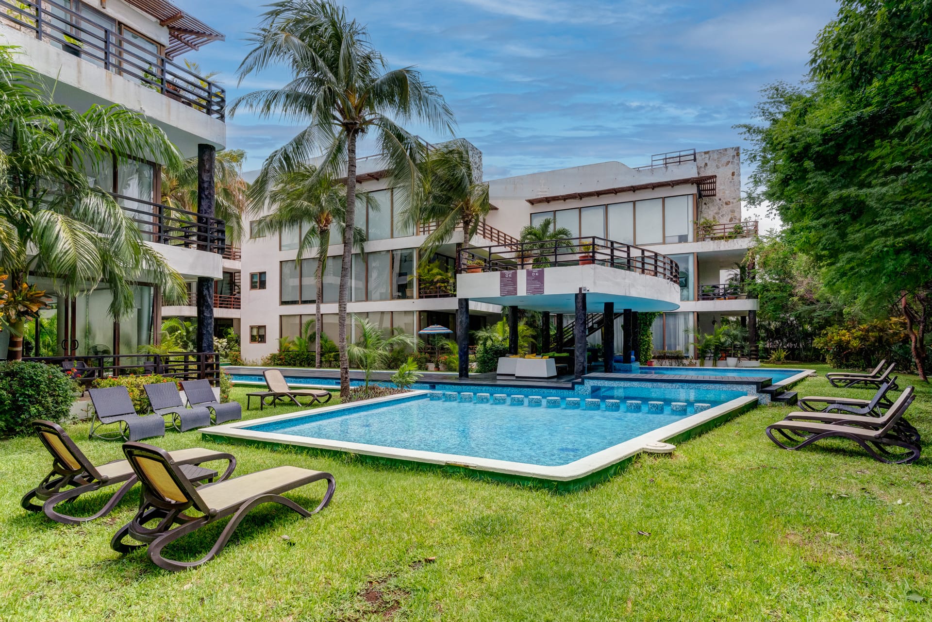s playacar condos for sale akoya common area garden