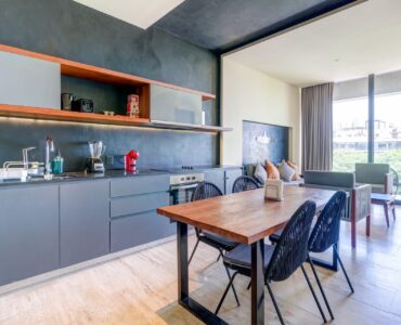 condo for sale in playa del carmen ceren two bedroom lockoff kitchen with table