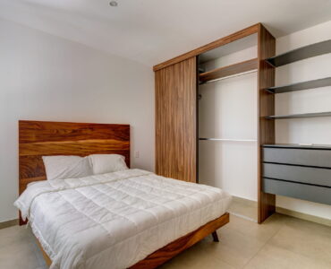 two bedroom condo riva playa del carmen bedroom with queen bed