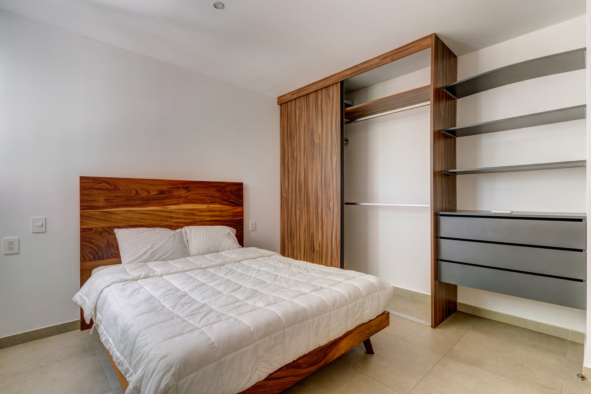two bedroom condo riva playa del carmen bedroom with queen bed