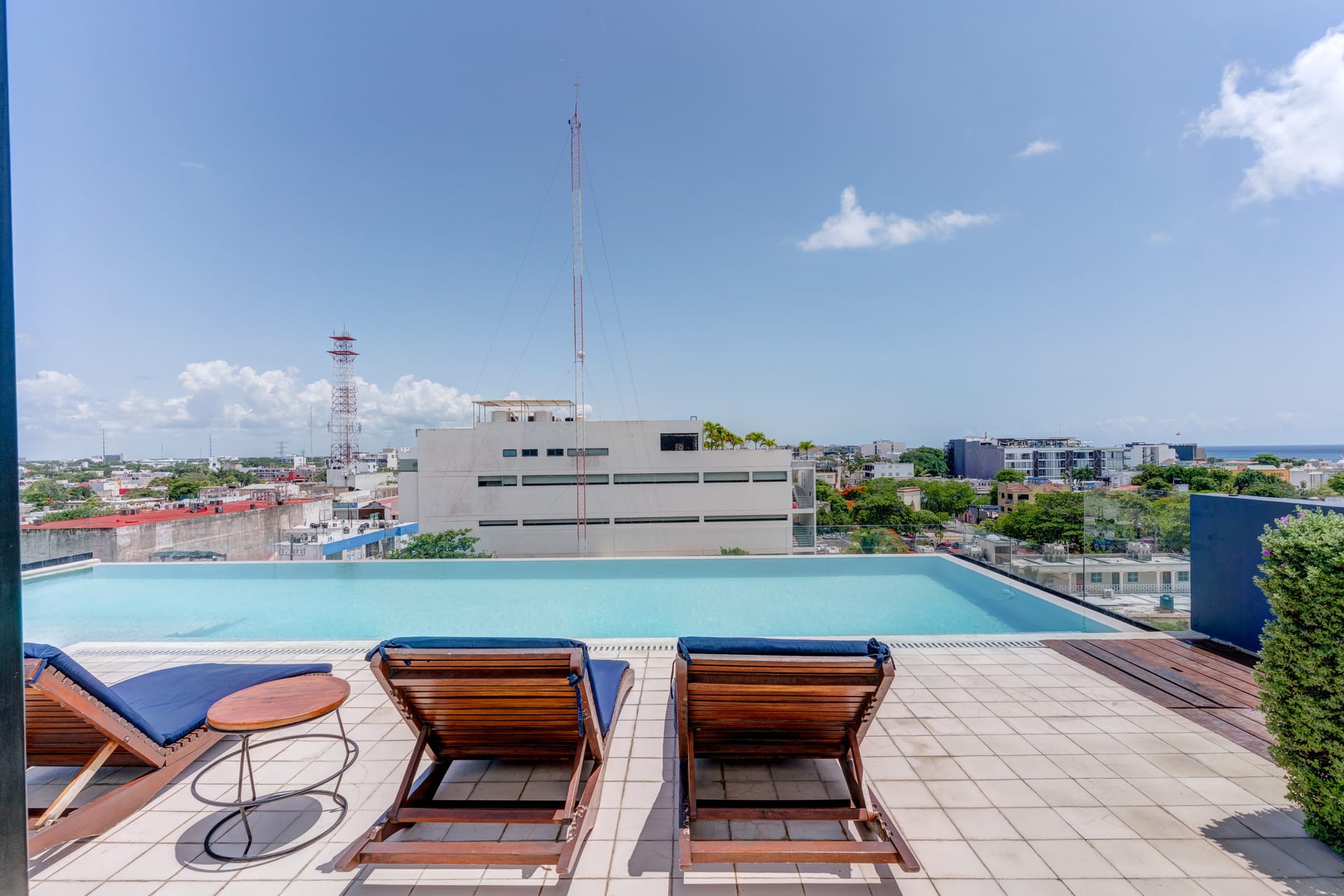 two bedroom condo riva playa del carmen sunbeds in pool