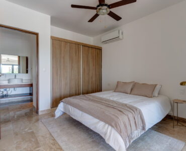 condo for sale in playa del carmen one bedroom condo ipana c208 bed with ac and fan