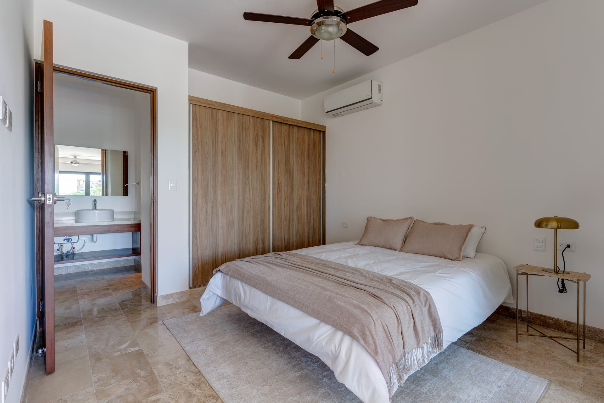 condo for sale in playa del carmen one bedroom condo ipana c208 bed with ac and fan