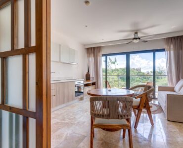 condo for sale in playa del carmen one bedroom condo ipana c208 table kitchen and living room