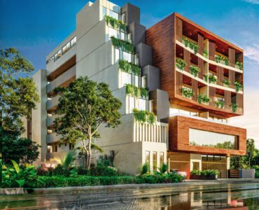 condos for sale in puerto morelos central living facade