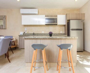 f condos for sale in tulum carmela island