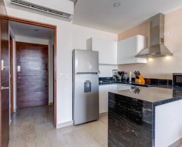 playa del carmen condos for sale 2 bedroom condo tzalam kitchen with ac