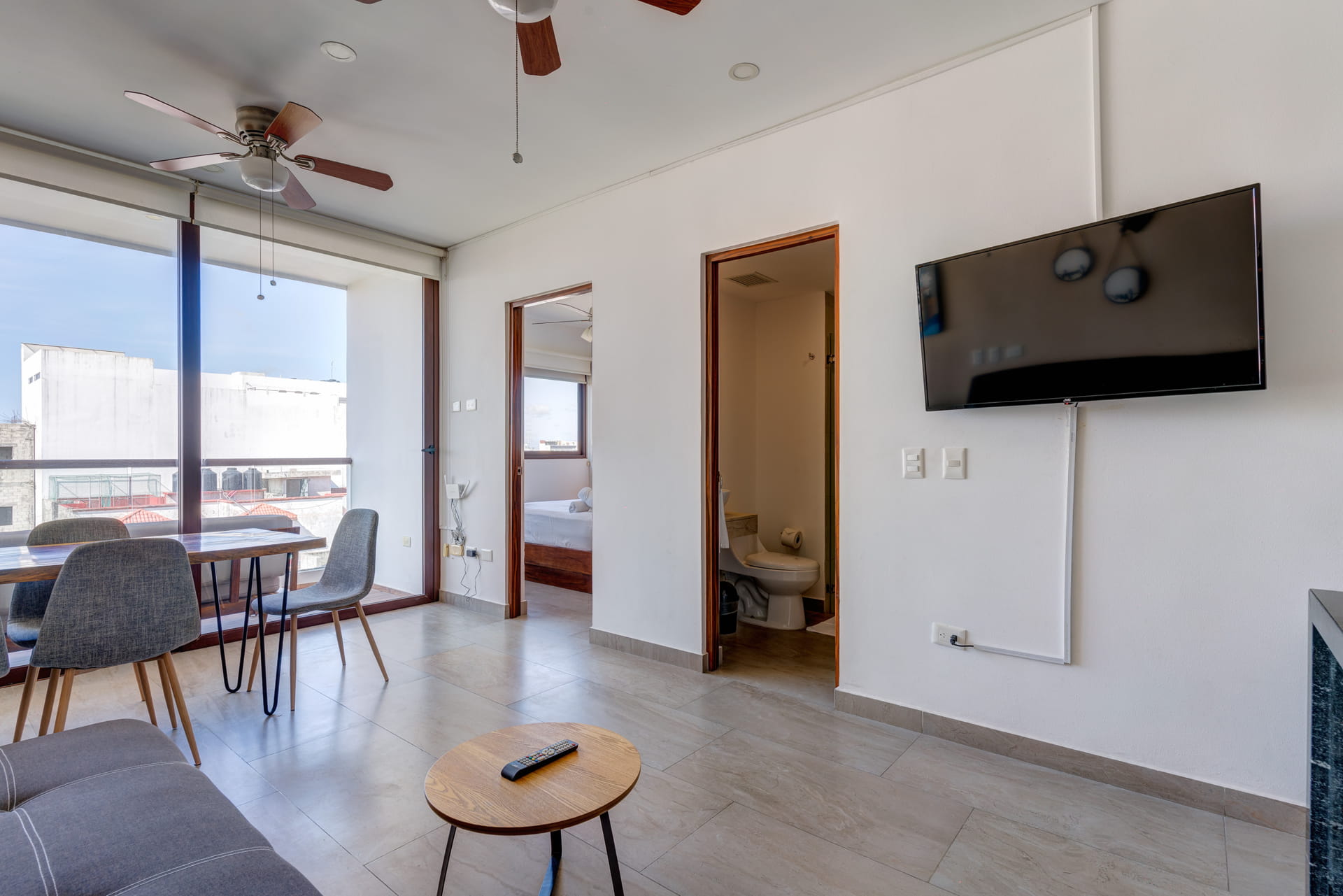 playa del carmen condos for sale 2 bedroom condo tzalam living room area with tv