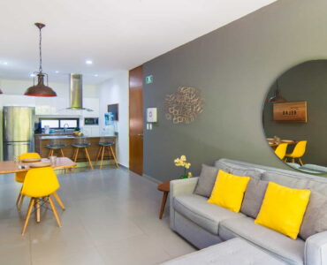 two bedroom ground floor condo in playa del carmen lunada living and dining room